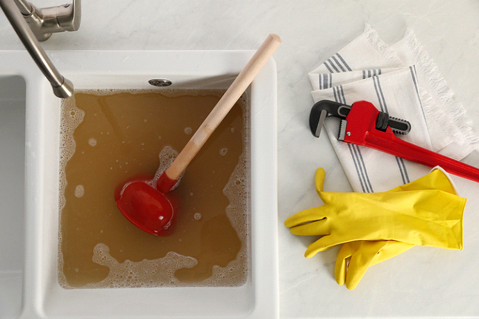 Black sludge and clogged sink drain