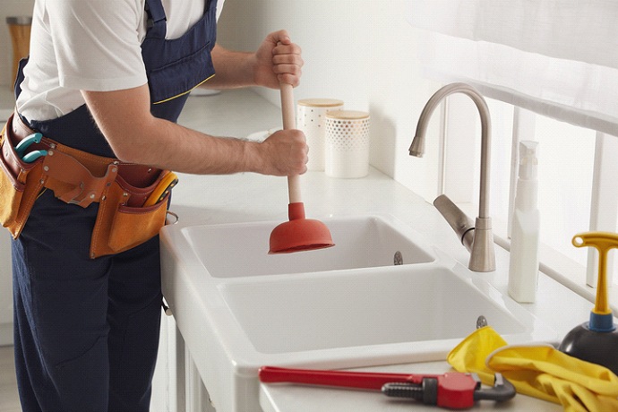 How to clean black sludge from sink drain