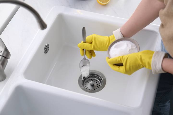 Baking soda and vinegar are one of the best home remedies for a clogged kitchen sink drain.