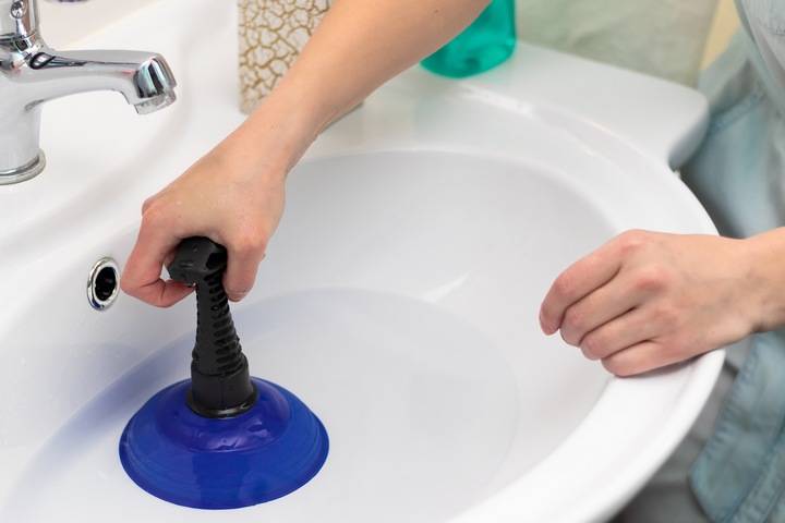 A plunger is one of the best home remedies for a clogged bathroom sink drain.