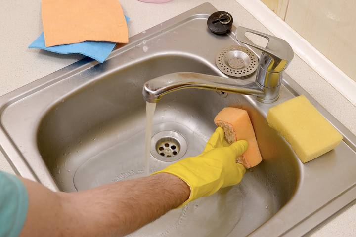 Regular cleaning will get rid of the kitchen sink smell.